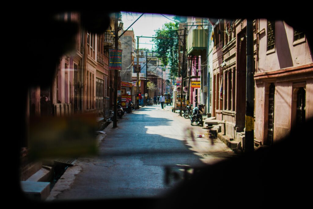 Explore the vibrant streets of Bikaner, India, showcasing historic architecture in lively alleys.